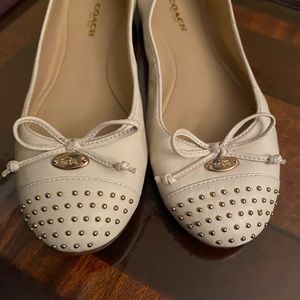 Light tan coach leather flats